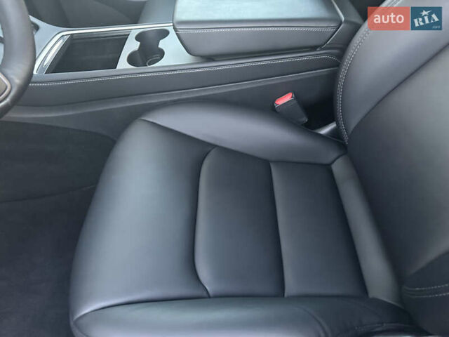 Белый Тесла Model Y, объемом двигателя 0 л и пробегом 80 тыс. км за 31500 $, фото 13 на Automoto.ua