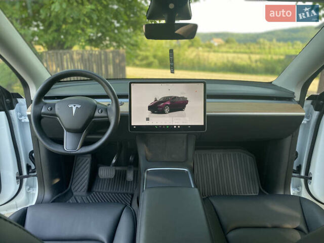 Белый Тесла Model Y, объемом двигателя 0 л и пробегом 58 тыс. км за 24000 $, фото 76 на Automoto.ua