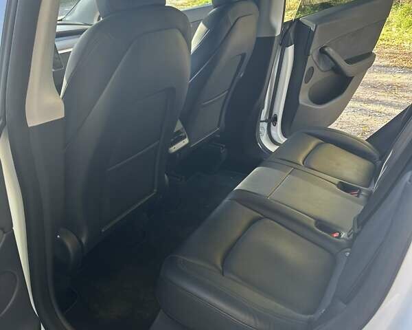 Білий Тесла Model Y, об'ємом двигуна 0 л та пробігом 62 тис. км за 29700 $, фото 12 на Automoto.ua