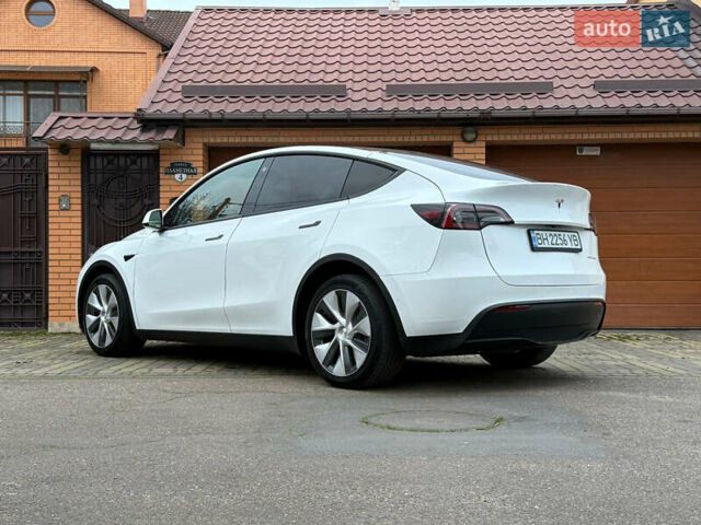 Белый Тесла Model Y, объемом двигателя 0 л и пробегом 57 тыс. км за 25000 $, фото 19 на Automoto.ua