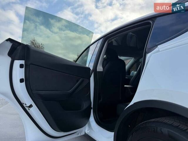 Тесла Model Y 2022 в Ровно на Automoto.ua Белый Тесла Model Y, объемом двигателя 0 л и пробегом 83 тыс. км за 22500 $, фото 42 на Automoto.ua