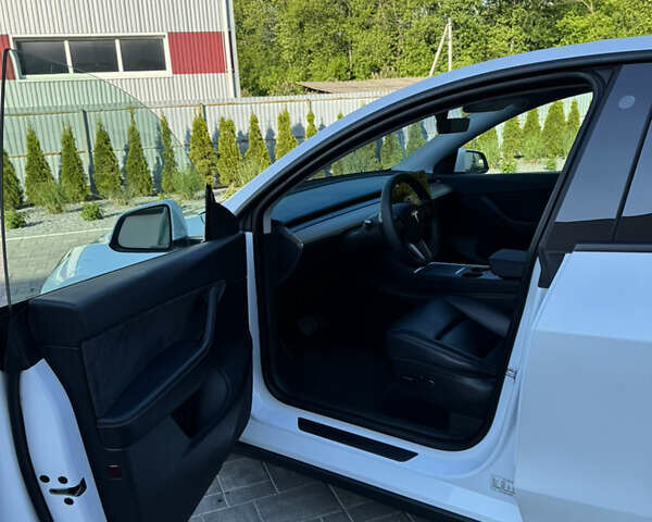 Білий Тесла Model Y, об'ємом двигуна 0 л та пробігом 79 тис. км за 25500 $, фото 12 на Automoto.ua
