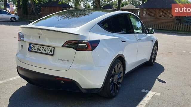 Белый Тесла Model Y, объемом двигателя 0 л и пробегом 62 тыс. км за 30700 $, фото 1 на Automoto.ua
