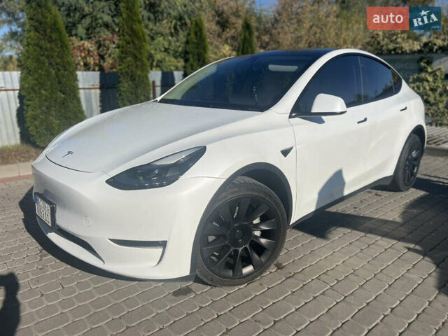 Белый Тесла Model Y, объемом двигателя 0 л и пробегом 69 тыс. км за 25900 $, фото 1 на Automoto.ua
