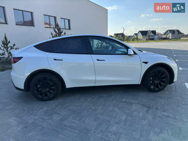 Білий Тесла Model Y, об'ємом двигуна 0 л та пробігом 79 тис. км за 25500 $, фото 7 на Automoto.ua