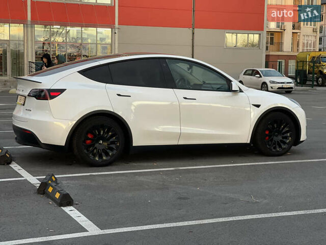 Белый Тесла Model Y, объемом двигателя 0 л и пробегом 117 тыс. км за 23200 $, фото 2 на Automoto.ua