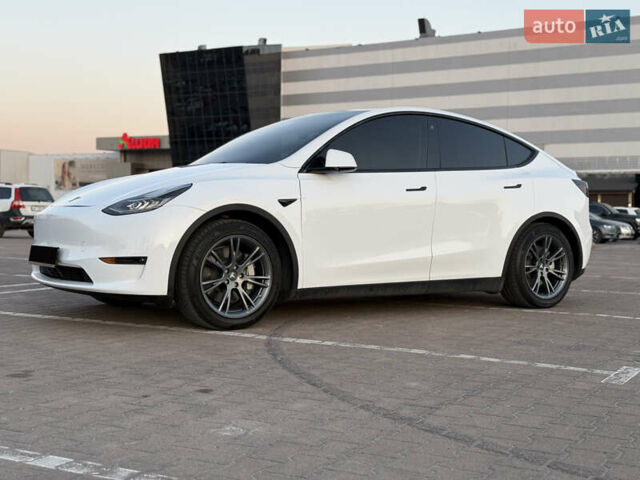 Білий Тесла Model Y, об'ємом двигуна 0 л та пробігом 58 тис. км за 24444 $, фото 5 на Automoto.ua