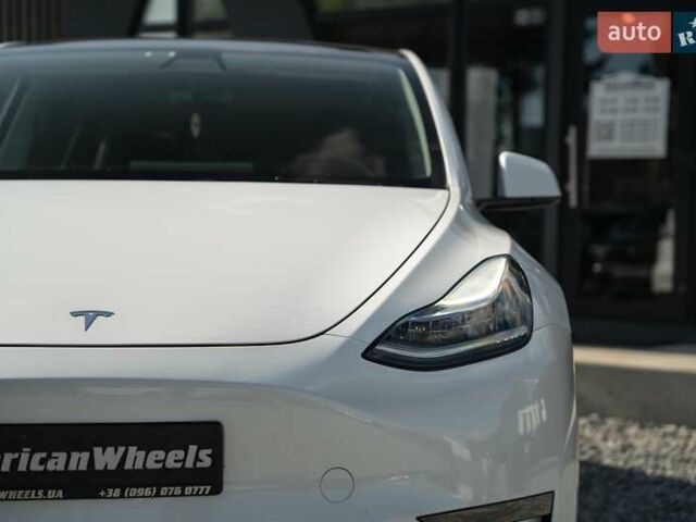Білий Тесла Model Y, об'ємом двигуна 0 л та пробігом 59 тис. км за 26500 $, фото 13 на Automoto.ua