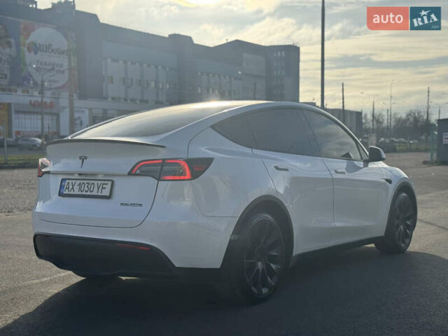 Білий Тесла Model Y, об'ємом двигуна 0 л та пробігом 53 тис. км за 28000 $, фото 6 на Automoto.ua