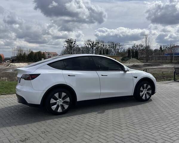 Белый Тесла Model Y, объемом двигателя 0 л и пробегом 66 тыс. км за 23999 $, фото 5 на Automoto.ua