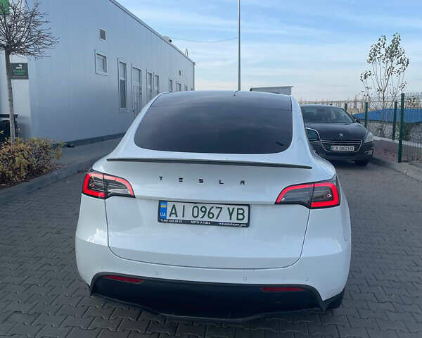 Білий Тесла Model Y, об'ємом двигуна 0 л та пробігом 60 тис. км за 24900 $, фото 4 на Automoto.ua