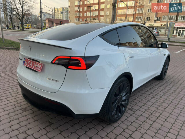 Белый Тесла Model Y, объемом двигателя 0 л и пробегом 21 тыс. км за 34999 $, фото 4 на Automoto.ua