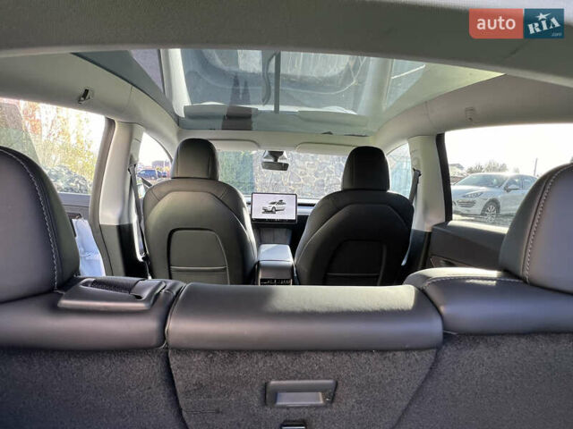 Білий Тесла Model Y, об'ємом двигуна 0 л та пробігом 12 тис. км за 24750 $, фото 54 на Automoto.ua
