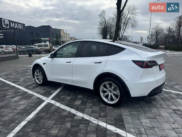 Білий Тесла Model Y, об'ємом двигуна 0 л та пробігом 100 тис. км за 23999 $, фото 4 на Automoto.ua