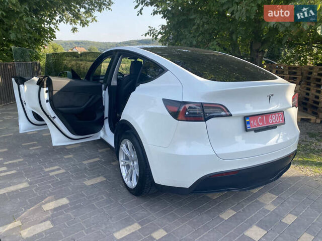 Белый Тесла Model Y, объемом двигателя 0 л и пробегом 58 тыс. км за 24000 $, фото 39 на Automoto.ua
