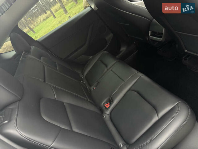 Белый Тесла Model Y, объемом двигателя 0 л и пробегом 74 тыс. км за 25700 $, фото 23 на Automoto.ua