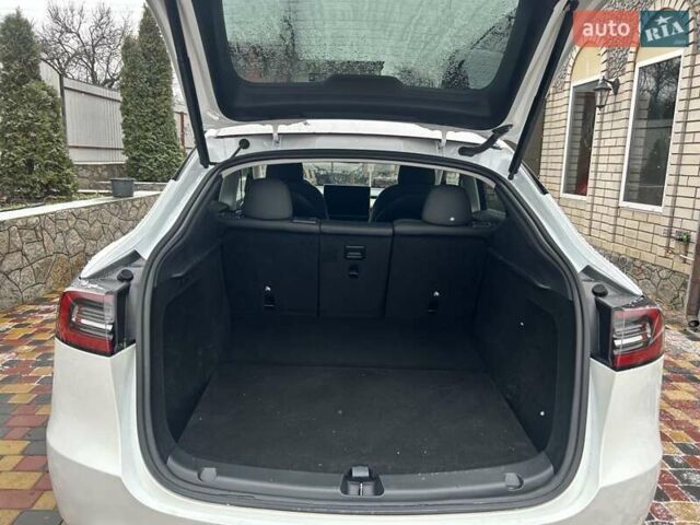 Белый Тесла Model Y, объемом двигателя 0 л и пробегом 94 тыс. км за 29999 $, фото 34 на Automoto.ua