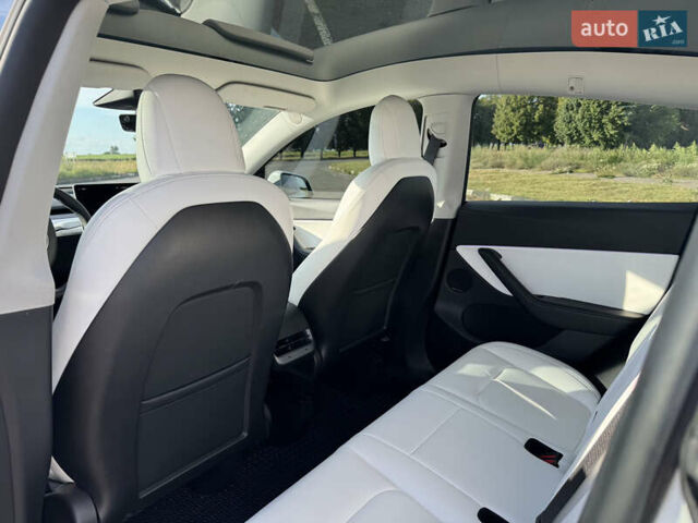 Белый Тесла Model Y, объемом двигателя 0 л и пробегом 51 тыс. км за 31000 $, фото 51 на Automoto.ua