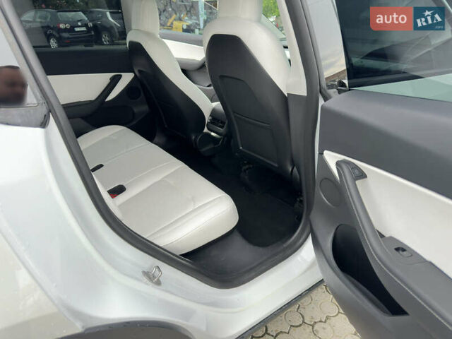 Білий Тесла Model Y, об'ємом двигуна 0 л та пробігом 49 тис. км за 32500 $, фото 23 на Automoto.ua