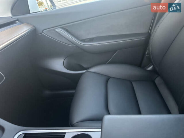 Белый Тесла Model Y, объемом двигателя 0 л и пробегом 80 тыс. км за 31500 $, фото 9 на Automoto.ua