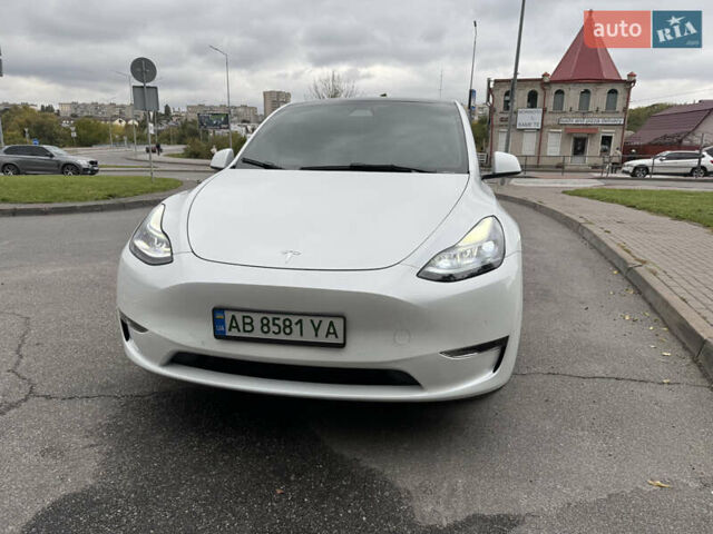 Білий Тесла Model Y, об'ємом двигуна 0 л та пробігом 82 тис. км за 25499 $, фото 1 на Automoto.ua