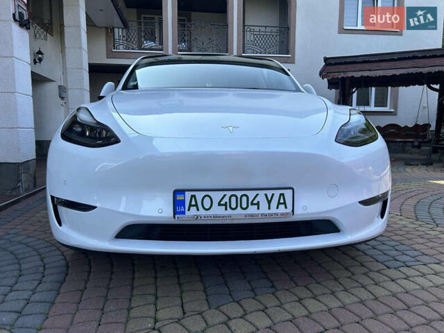 Белый Тесла Model Y, объемом двигателя 0 л и пробегом 129 тыс. км за 36499 $, фото 3 на Automoto.ua