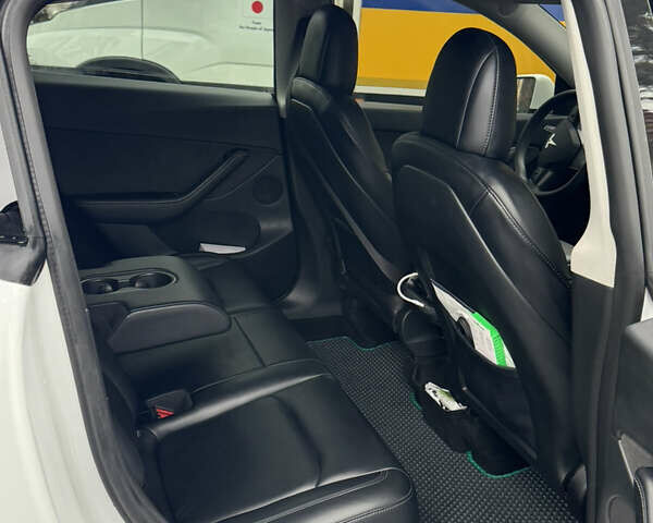 Білий Тесла Model Y, об'ємом двигуна 0 л та пробігом 96 тис. км за 22499 $, фото 11 на Automoto.ua