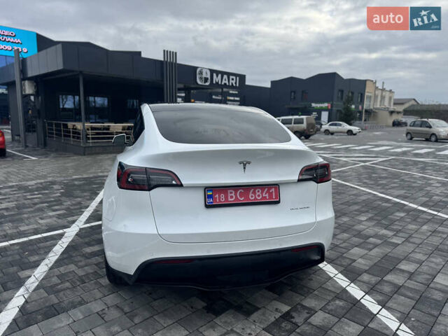 Білий Тесла Model Y, об'ємом двигуна 0 л та пробігом 100 тис. км за 23999 $, фото 6 на Automoto.ua