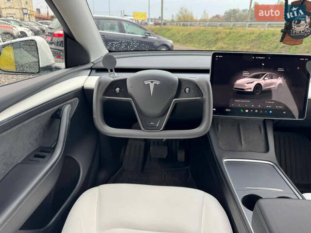 Білий Тесла Model Y, об'ємом двигуна 0 л та пробігом 62 тис. км за 27400 $, фото 23 на Automoto.ua