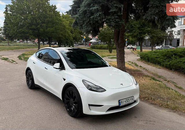 Білий Тесла Model Y, об'ємом двигуна 0 л та пробігом 80 тис. км за 33000 $, фото 4 на Automoto.ua