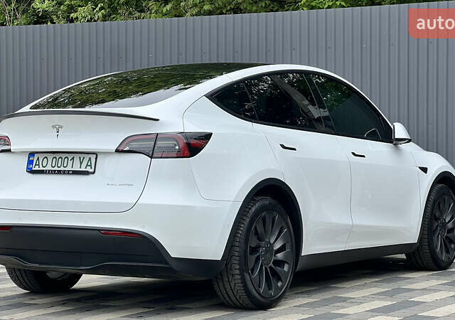 Белый Тесла Model Y, объемом двигателя 0 л и пробегом 90 тыс. км за 34999 $, фото 10 на Automoto.ua