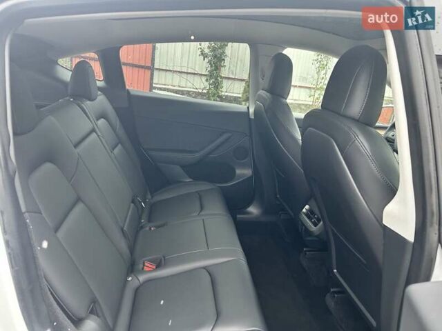 Белый Тесла Model Y, объемом двигателя 0 л и пробегом 94 тыс. км за 29999 $, фото 11 на Automoto.ua