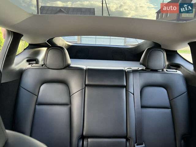 Белый Тесла Model Y, объемом двигателя 0 л и пробегом 25 тыс. км за 31500 $, фото 23 на Automoto.ua