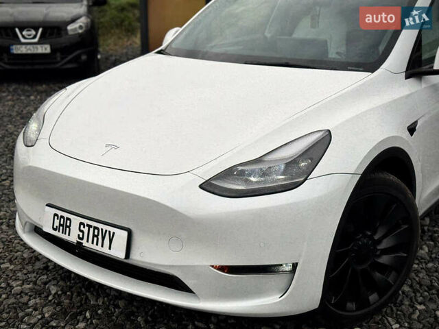 Білий Тесла Model Y, об'ємом двигуна 0 л та пробігом 62 тис. км за 27400 $, фото 4 на Automoto.ua