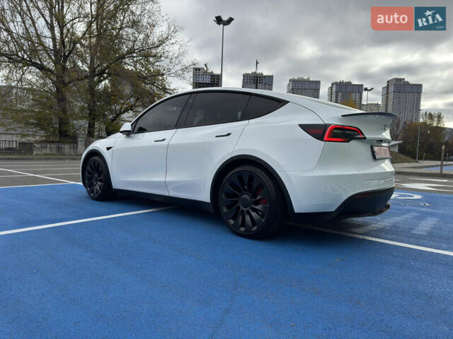 Белый Тесла Model Y, объемом двигателя 0 л и пробегом 68 тыс. км за 35000 $, фото 7 на Automoto.ua