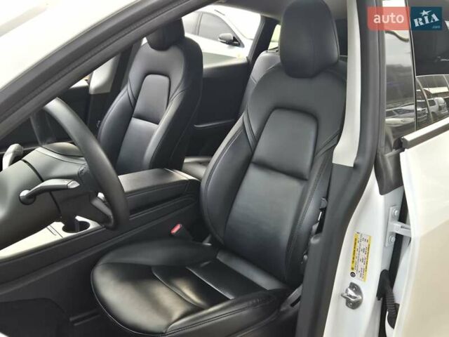 Белый Тесла Model Y, объемом двигателя 0 л и пробегом 70 тыс. км за 31500 $, фото 8 на Automoto.ua