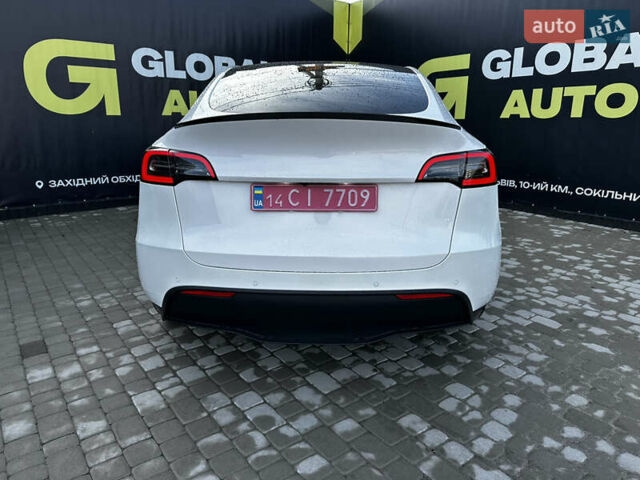 Белый Тесла Model Y, объемом двигателя 0 л и пробегом 61 тыс. км за 24700 $, фото 5 на Automoto.ua