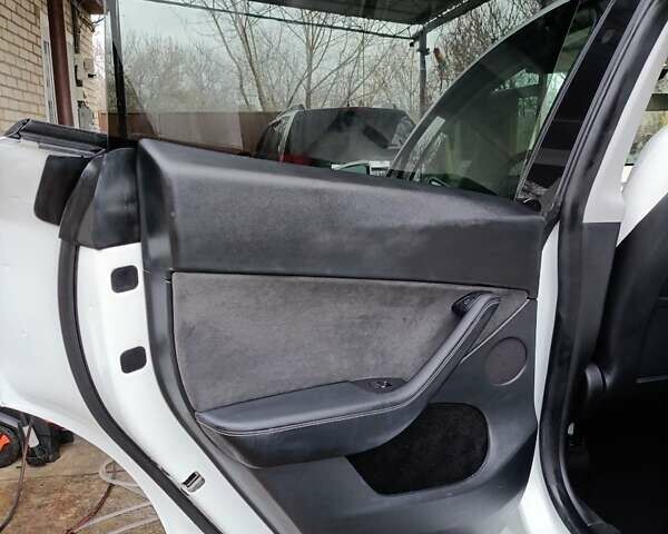 Белый Тесла Model Y, объемом двигателя 0 л и пробегом 52 тыс. км за 29000 $, фото 27 на Automoto.ua