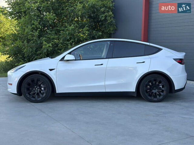 Белый Тесла Model Y, объемом двигателя 0 л и пробегом 55 тыс. км за 23900 $, фото 1 на Automoto.ua