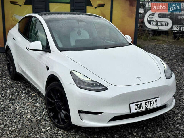 Білий Тесла Model Y, об'ємом двигуна 0 л та пробігом 62 тис. км за 27400 $, фото 11 на Automoto.ua
