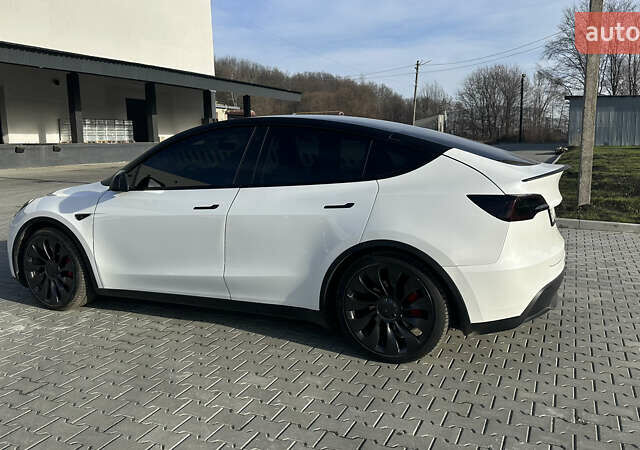 Білий Тесла Model Y, об'ємом двигуна 0 л та пробігом 63 тис. км за 28700 $, фото 23 на Automoto.ua