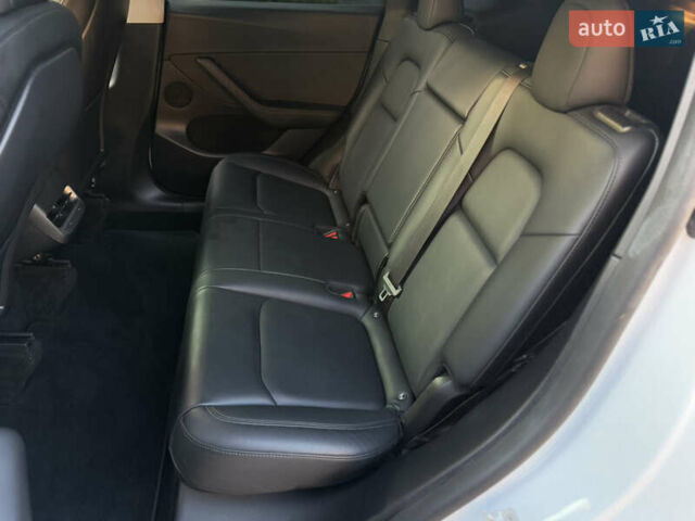 Белый Тесла Model Y, объемом двигателя 0 л и пробегом 59 тыс. км за 28950 $, фото 33 на Automoto.ua