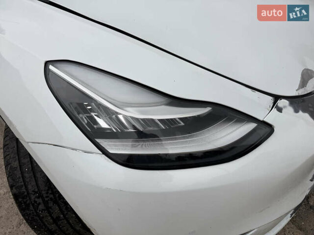 Белый Тесла Model Y, объемом двигателя 0 л и пробегом 36 тыс. км за 15500 $, фото 2 на Automoto.ua
