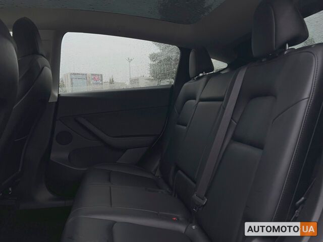 Белый Тесла Model Y, объемом двигателя 82 л и пробегом 22 тыс. км за 41600 $, фото 9 на Automoto.ua