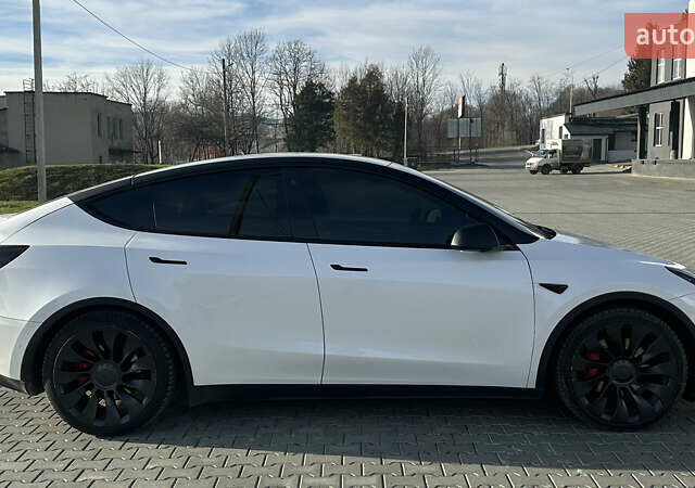 Білий Тесла Model Y, об'ємом двигуна 0 л та пробігом 63 тис. км за 28700 $, фото 7 на Automoto.ua