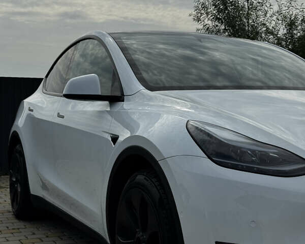 Белый Тесла Model Y, объемом двигателя 0 л и пробегом 91 тыс. км за 29600 $, фото 1 на Automoto.ua