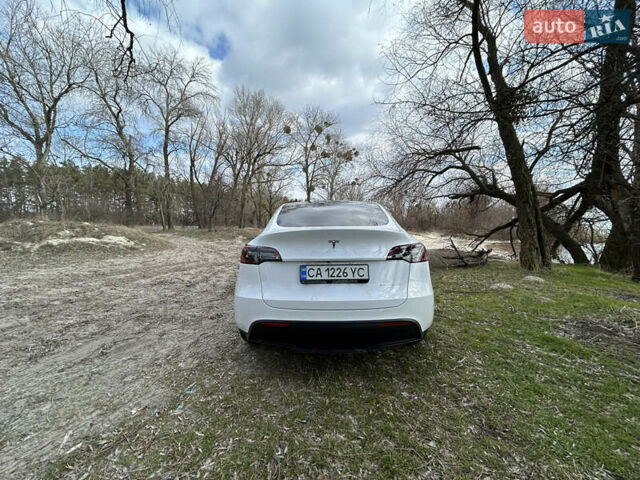 Белый Тесла Model Y, объемом двигателя 0 л и пробегом 6 тыс. км за 36900 $, фото 6 на Automoto.ua