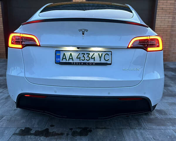 Белый Тесла Model Y, объемом двигателя 0 л и пробегом 58 тыс. км за 40000 $, фото 10 на Automoto.ua