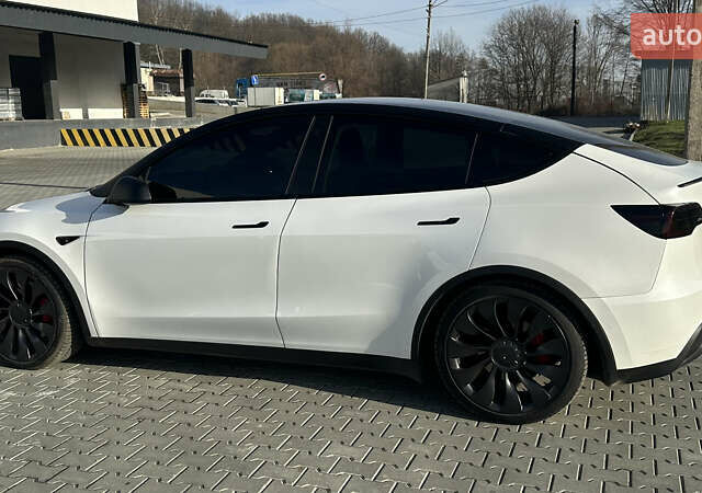 Білий Тесла Model Y, об'ємом двигуна 0 л та пробігом 63 тис. км за 28700 $, фото 11 на Automoto.ua