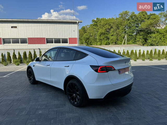 Білий Тесла Model Y, об'ємом двигуна 0 л та пробігом 79 тис. км за 25500 $, фото 4 на Automoto.ua